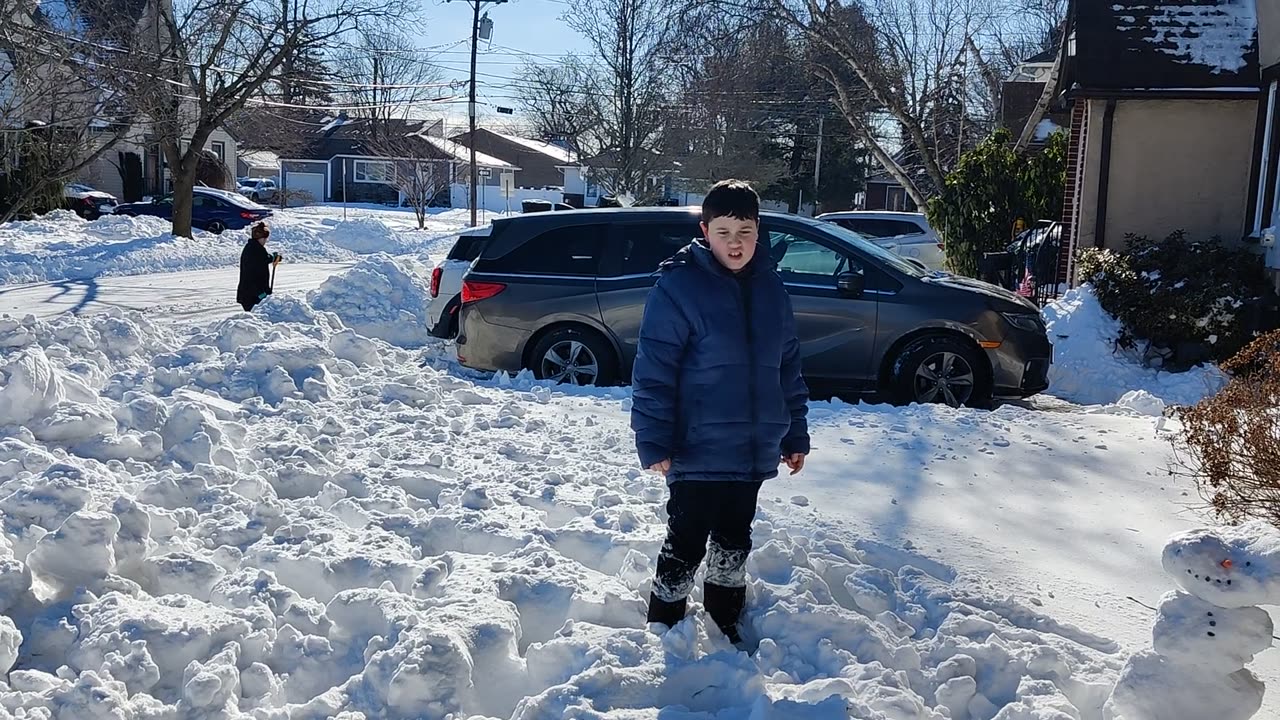 Spencer and his snowman VID_20220130_101612