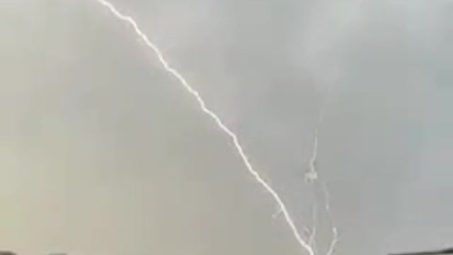 Rising lightning strike over Mount Shada (Saudi Arabia, 09/12/2021).