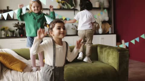 Kids Jumping on the Sofa