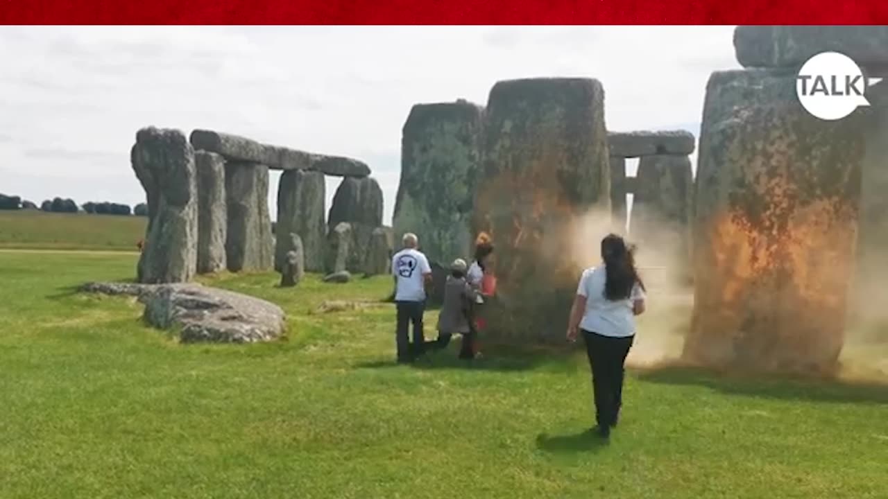 Anti-oil activists douse Stonehenge with orange paint ahead of summer solstice