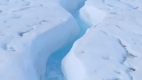 KAYAKING THROUGH ICE TUNNELS