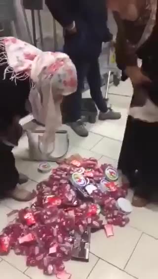 Two Muslim women caught using their Burqas to steal Snickers chocolate bars at a Lidl store