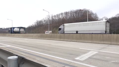 A car on a highway in Korea.