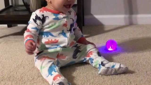 Baby Belly Laughs Over A Ball