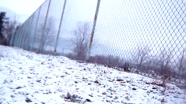 Sledding down a hill in Burlington, Vermont in Winter