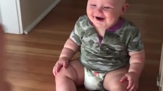 Baby laughing hysterically