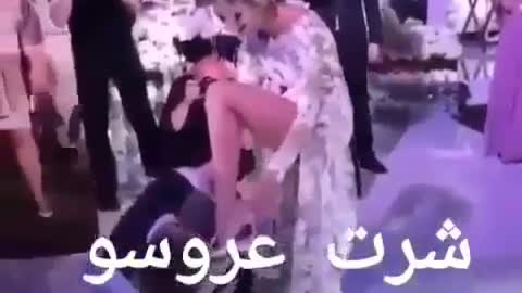 She takes off her bridal shorts