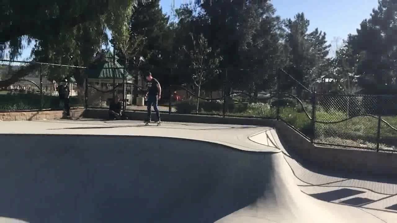 Guy Performs Backflip on Skateboard