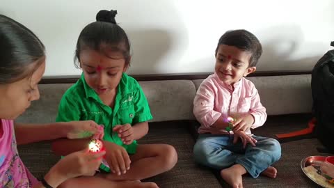 raksha bandhan in baby boy hand