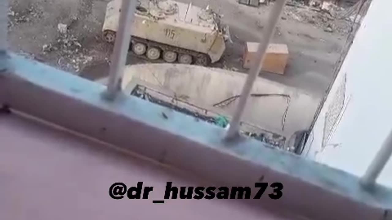 The IDF’s automated mechanisms "robots" place explosive boxes at the gates of Kamal Adwan Hospital.