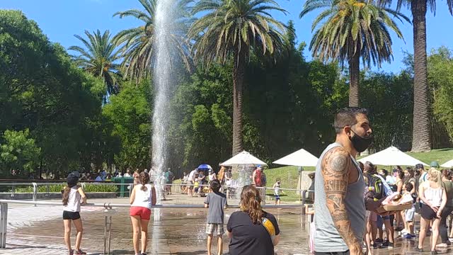 Children gathered in the fountain