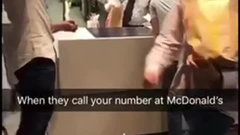 Guys cheer when their order number is called at mcdonalds