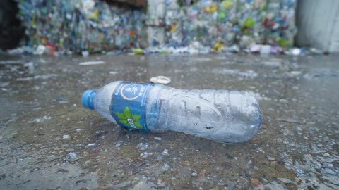 An Empty Plastic Bottle Lying On The Floor