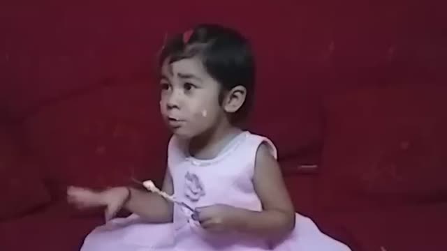 Little girl enjoying birthday party with cake 🍰🍰