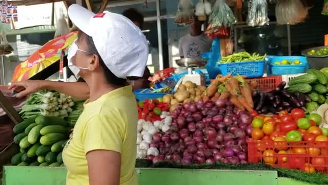 SEE LOTS OF STORE IN THE STREET.