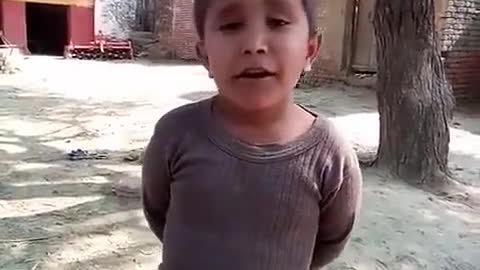 Small cute boy singing