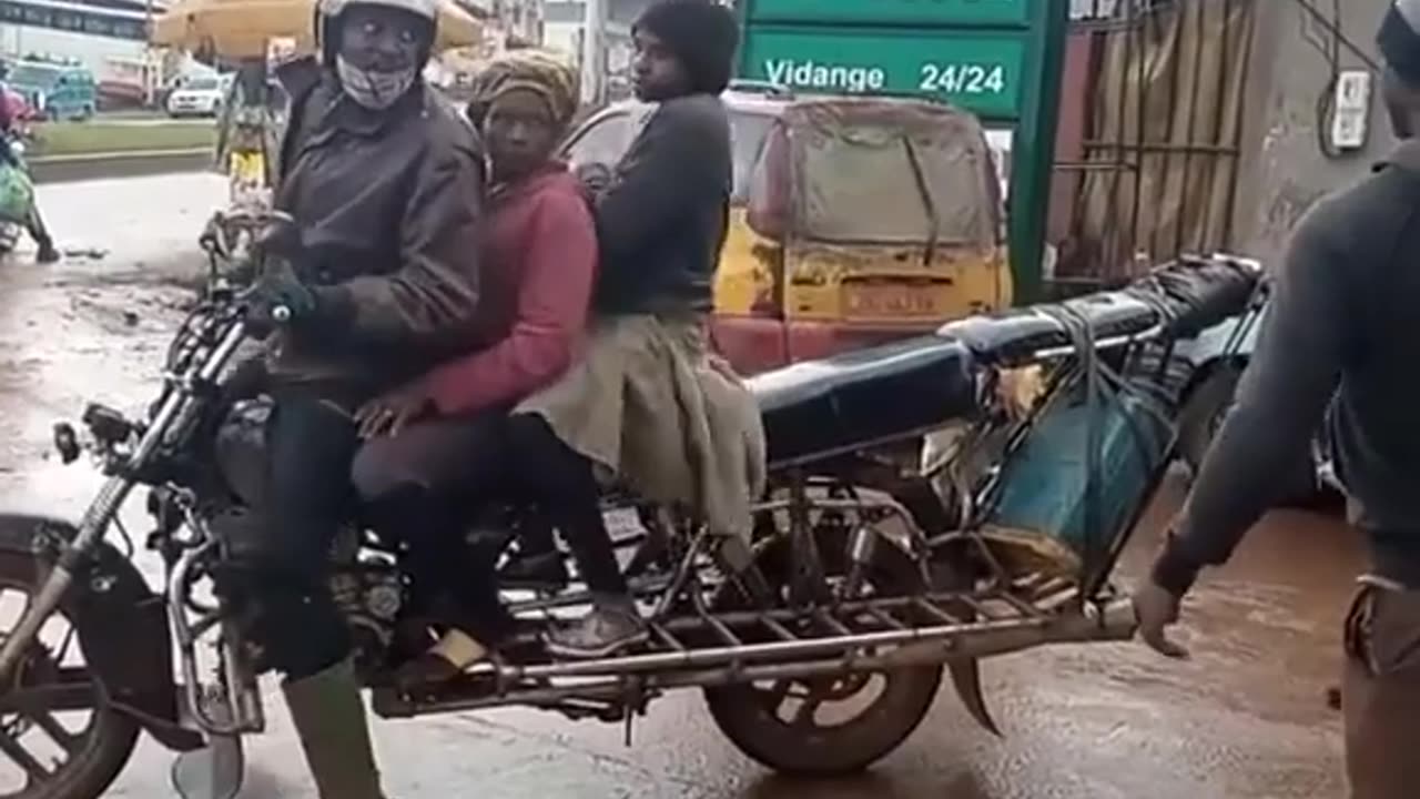 Commercial Motor Cycle Operator in Nigeria converts his bike to carry more passengers.