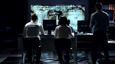 Scientist working on space control center