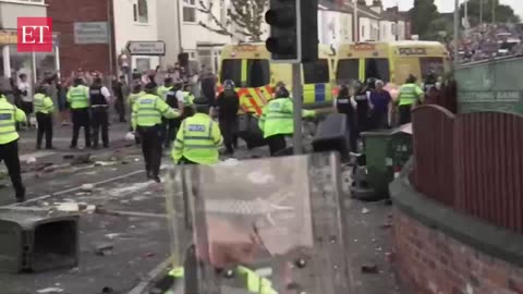 UK knife attack: Fires burn on Southport streets as anti-Muslim protesters clash with police
