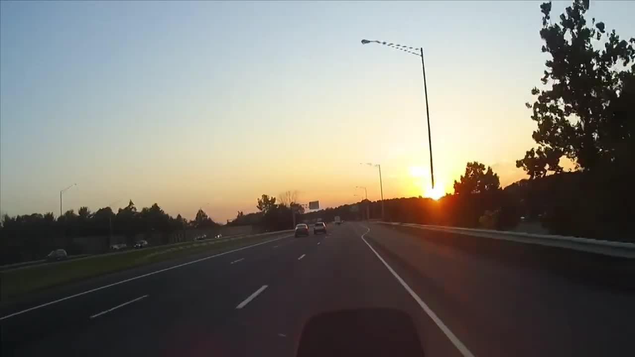 Swerving Car Almost Crashed Into Another in the Center Lane