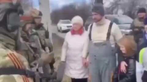 Russian Soldiers speaking with Ukraine Citizens