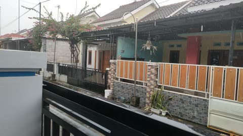 Rain in front of the house