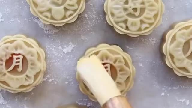 white lotus mooncakes with salted egg yolk for the Mid-Autumn Festival are seriously perfect