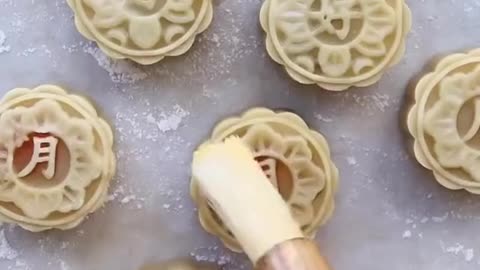 white lotus mooncakes with salted egg yolk for the Mid-Autumn Festival are seriously perfect