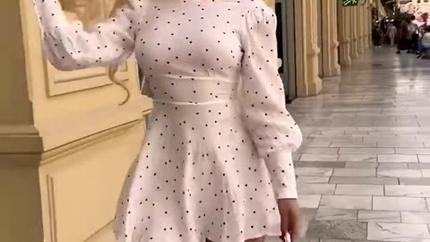 She look glamorous with this beautiful flowery dress