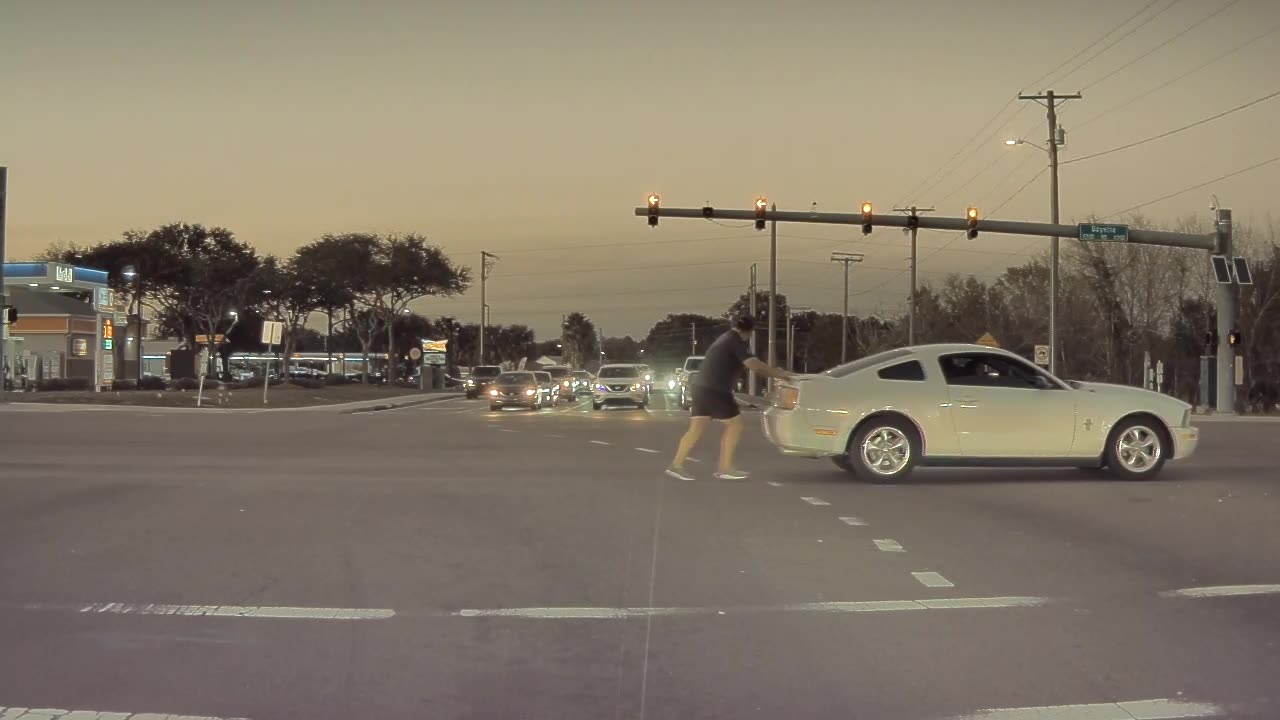 Florida Man Pushes Ford Mustang With Police Close Behind