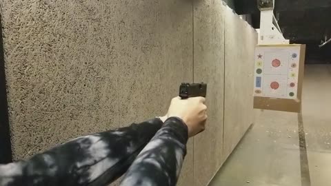 Emily with the Glock Slooo Motion