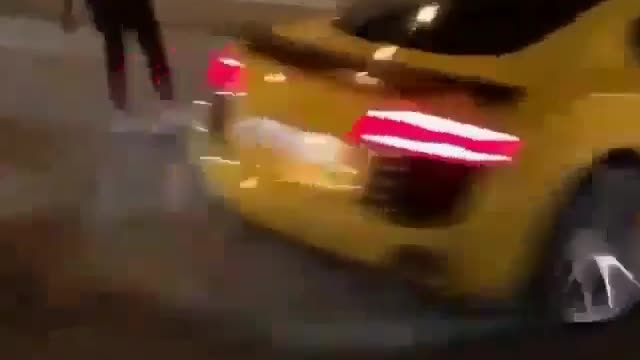 Audi R8 drifts through a bend