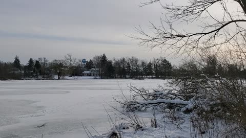 Frozen Neighborhood Pond at Sunset