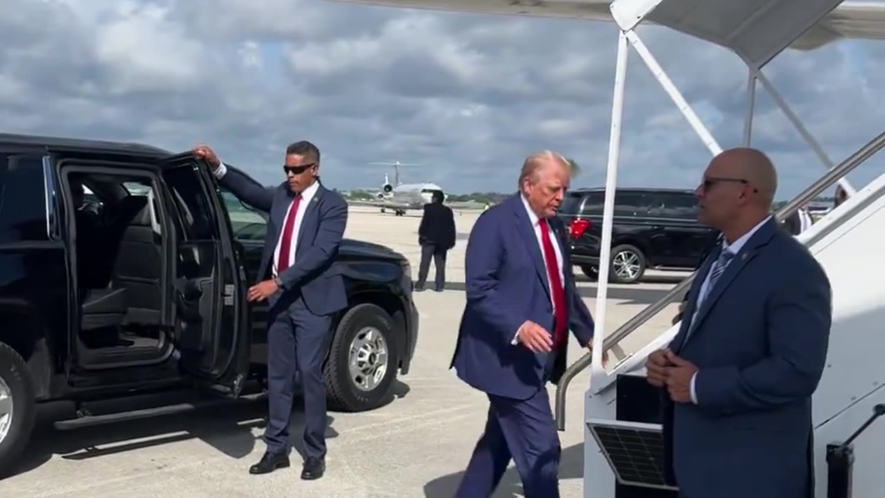 President Donald Trump departs for Michigan