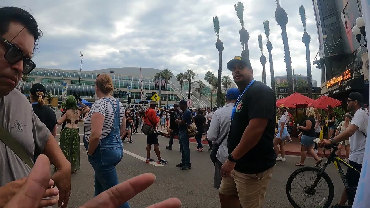 tough guy acts tough while preacher eats pineapples