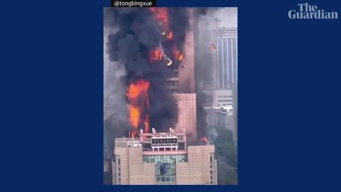 Huge fire engulfs skyscraper in China