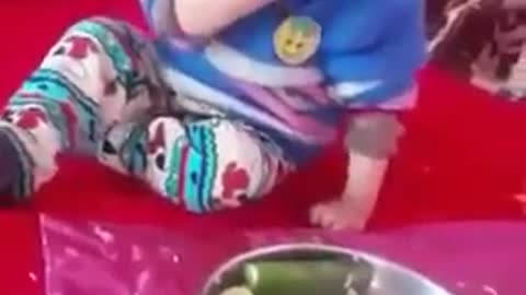 The boy who had eaten too much food fell asleep on the bow