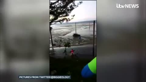 Japan and US warn residents to keep away from shore after Tonga volcano eruption | ITV News