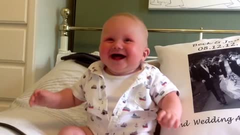 Baby laughing and chuckling