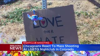 Chicagoans hold vigil for victims of mass shooting at LGBTQ night club in Colorado