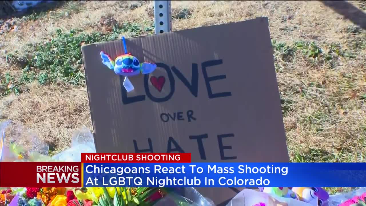 Chicagoans hold vigil for victims of mass shooting at LGBTQ night club in Colorado