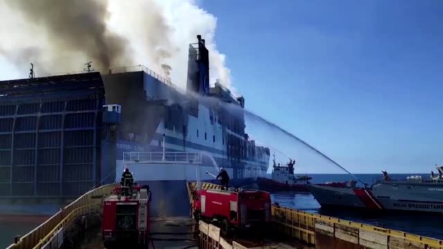 Greek firefighters battle ferry blaze