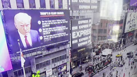 Donald Trump's Indictments on Times square commercial screens.