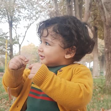 Playing Naughty Boy in Autumn Leaves