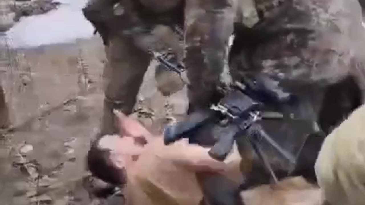 Russian Soldiers Getting Payback From Captured Terrorist