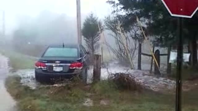 Car Hits Fire Hydrant and Gets Stuck on Top