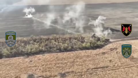 Russian and Ukrainian Tanks Firing at Each Other from Across Battlefield