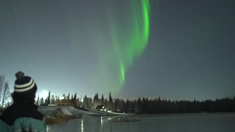 Rock Chirping Under Northern Lights