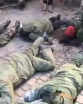 Ukrainian National Guard Shooting Russian P O W 's. Shocking Abuse 2/2