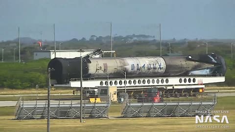 Falcon 9 B1077 first stage placed in SpaceX hangar